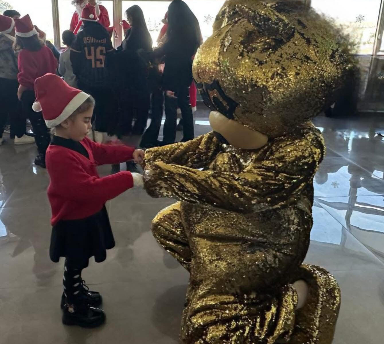 Children with presents and Santa