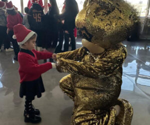 Children with presents and Santa